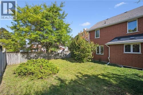 View of fenced backyard - 599 Beechwood Drive, Waterloo, ON - Outdoor