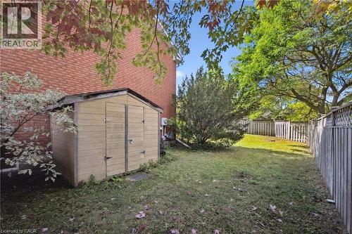 Fenced backyard with a storage shed - 599 Beechwood Drive, Waterloo, ON - Outdoor