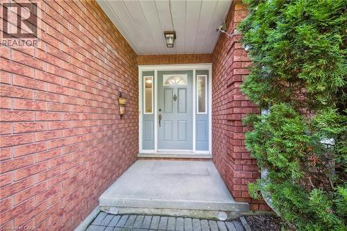 Property entrance featuring brick siding - 599 Beechwood Drive, Waterloo, ON - Outdoor With Exterior