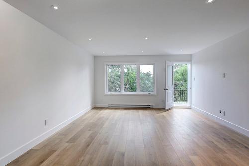 Living room - 417 Av. Smart, Montréal-Ouest, QC - Indoor Photo Showing Other Room