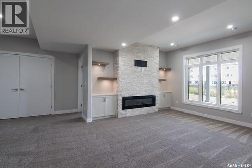 423 Sharma Crescent, Saskatoon, SK - Indoor With Fireplace