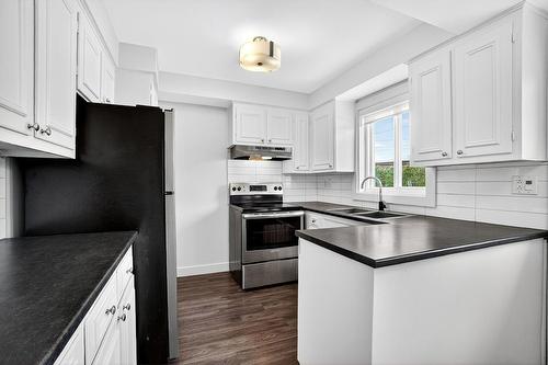 Kitchen - 453 93E Avenue, Laval (Chomedey), QC - Indoor Photo Showing Kitchen With Double Sink