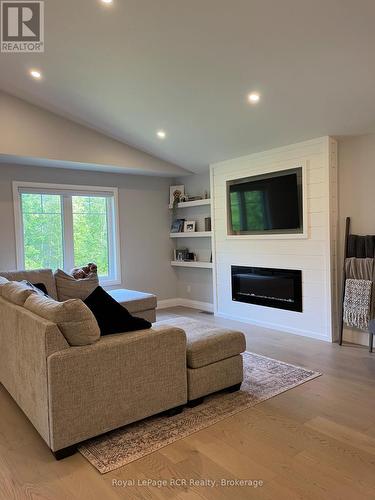 52 Birch Street, South Bruce Peninsula, ON - Indoor Photo Showing Living Room With Fireplace
