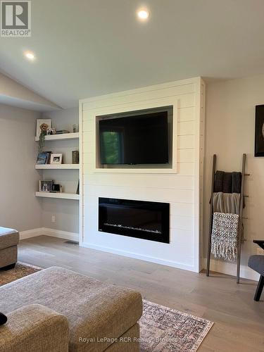 52 Birch Street, South Bruce Peninsula, ON - Indoor Photo Showing Living Room With Fireplace