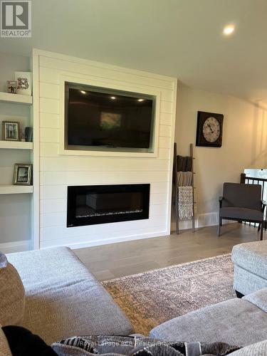 52 Birch Street, South Bruce Peninsula, ON - Indoor Photo Showing Living Room With Fireplace