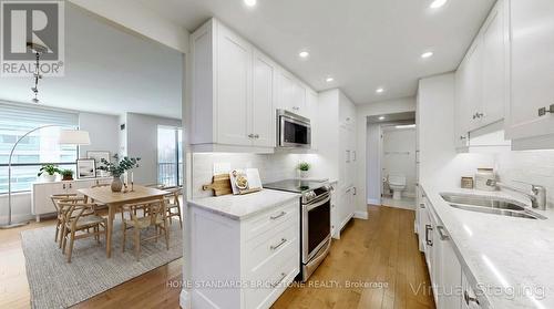 803 - 47 St Clair Avenue W, Toronto, ON - Indoor Photo Showing Kitchen With Double Sink With Upgraded Kitchen
