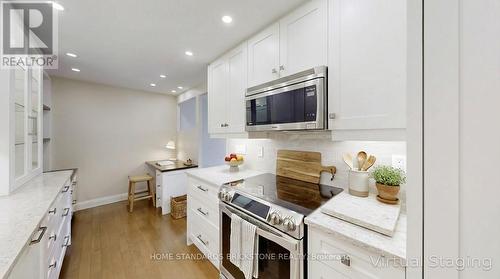 803 - 47 St Clair Avenue W, Toronto, ON - Indoor Photo Showing Kitchen With Upgraded Kitchen