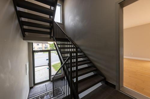 Staircase - 101-5030 Boul. Léger, Montréal (Montréal-Nord), QC - Indoor Photo Showing Other Room