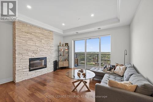 2308 - 505 Talbot Street, London East (East F), ON - Indoor Photo Showing Living Room With Fireplace