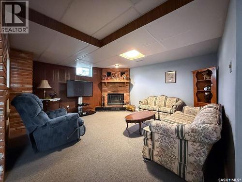 568 Poplar Crescent, Shaunavon, SK - Indoor Photo Showing Basement With Fireplace