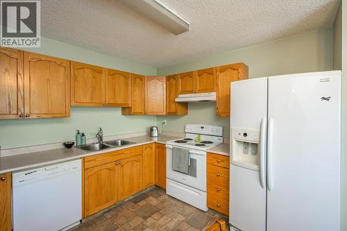 102 3233 Mcgill Crescent, Prince George, BC - Indoor Photo Showing Kitchen With Double Sink