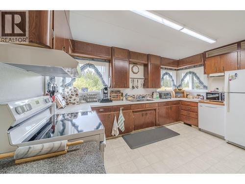 1208 Cariboo 97 Highway, 70 Mile House, BC - Indoor Photo Showing Kitchen With Double Sink