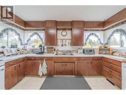 1208 Cariboo 97 Highway, 70 Mile House, BC - Indoor Photo Showing Kitchen With Double Sink