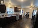 5524 48 Street, Fort Nelson, BC  - Indoor Photo Showing Kitchen With Double Sink 