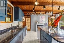 Kitchen opens to Bathroom and Office - 