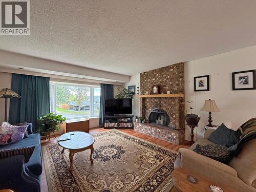 1235 Pigeon Avenue, Williams Lake, BC - Indoor Photo Showing Living Room With Fireplace