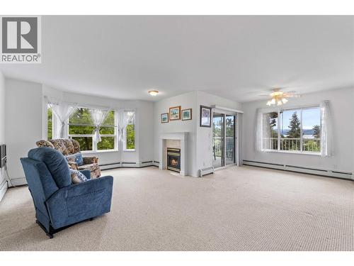 250 5 Street Se Unit# 314, Salmon Arm, BC - Indoor Photo Showing Living Room With Fireplace