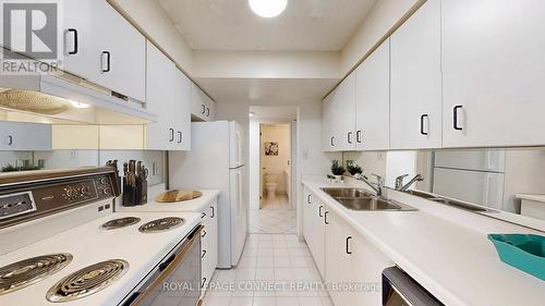 1002 - 47 St Clair Avenue W, Toronto, ON - Indoor Photo Showing Kitchen With Double Sink