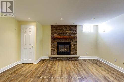 504 Baldwin Crescent, Woodstock (Woodstock - North), ON - Indoor Photo Showing Living Room With Fireplace