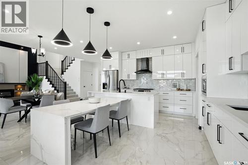 319 Woolf Bay, Saskatoon, SK - Indoor Photo Showing Kitchen With Upgraded Kitchen