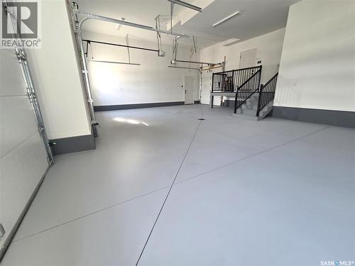 319 Woolf Bay, Saskatoon, SK - Indoor Photo Showing Garage
