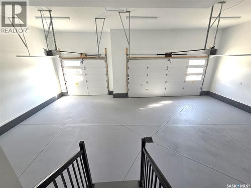 319 Woolf Bay, Saskatoon, SK - Indoor Photo Showing Garage