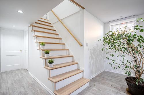 Staircase - 7 Rue Jean-Cadieux, Boucherville, QC - Indoor Photo Showing Other Room
