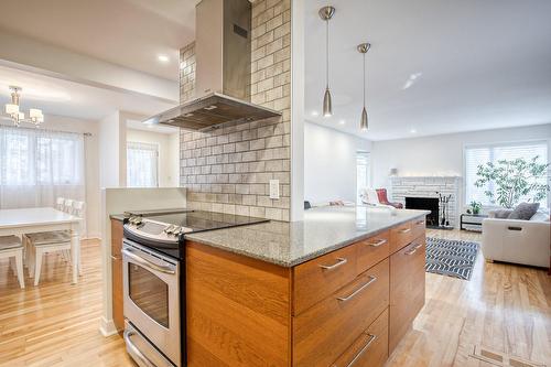Kitchen - 7 Rue Jean-Cadieux, Boucherville, QC - Indoor Photo Showing Other Room With Fireplace