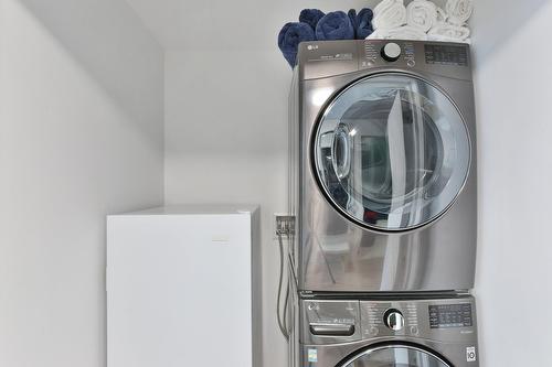 Salle de lavage - 714-700 Rue Des Éclaircies, Brossard, QC - Indoor Photo Showing Laundry Room