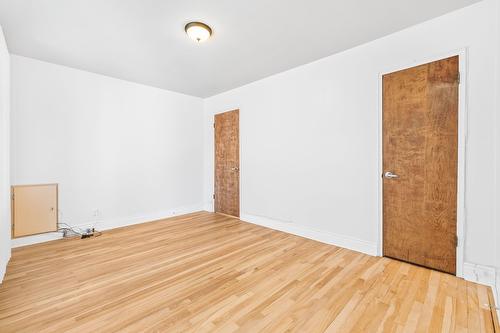 Primary bedroom - 20 Rue Émile, Laval (Laval-Des-Rapides), QC - Indoor Photo Showing Other Room