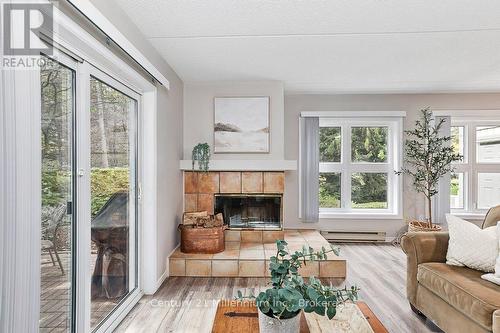 24 - 409 Mariners Way, Collingwood, ON - Indoor Photo Showing Living Room With Fireplace