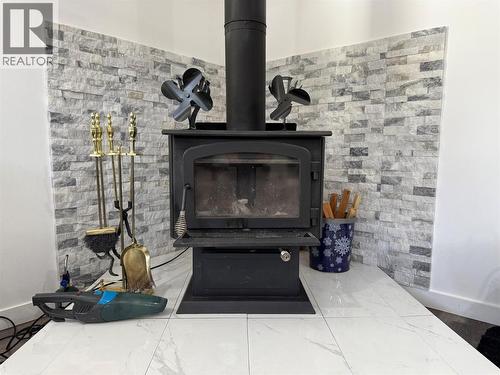 6135 12Th Street, Grand Forks, BC - Indoor Photo Showing Living Room With Fireplace