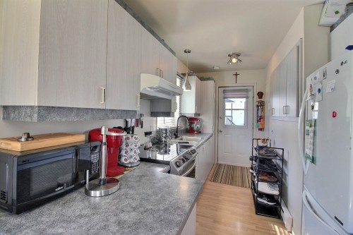 Cuisine - 736 Ch. Du Golf, La Malbaie, QC - Indoor Photo Showing Kitchen With Double Sink
