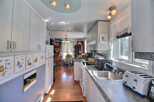 Cuisine - 736 Ch. Du Golf, La Malbaie, QC - Indoor Photo Showing Kitchen With Double Sink
