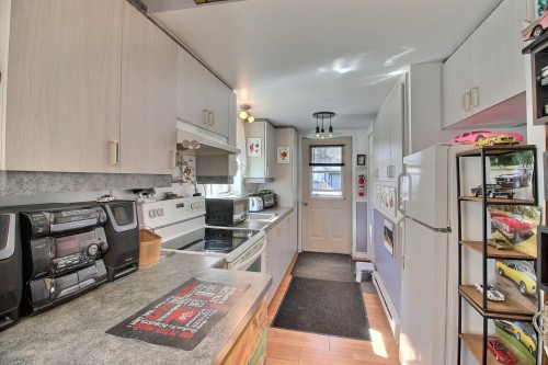 Cuisine - 736 Ch. Du Golf, La Malbaie, QC - Indoor Photo Showing Kitchen