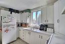 Cuisine - 738  - 740 Ch. Du Golf, La Malbaie, QC  - Indoor Photo Showing Kitchen 