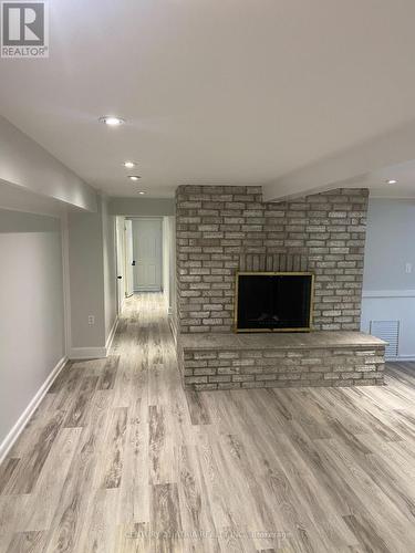 27 Waterbend Drive, Georgina, ON - Indoor Photo Showing Living Room With Fireplace