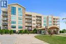 34 Boblo Island Boulevard Unit# 306, Amherstburg, ON  - Outdoor With Balcony With Facade 
