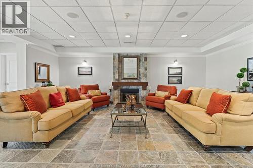 34 Boblo Island Boulevard Unit# 306, Amherstburg, ON - Indoor Photo Showing Living Room With Fireplace