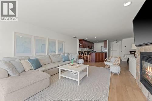 34 Boblo Island Boulevard Unit# 306, Amherstburg, ON - Indoor Photo Showing Living Room With Fireplace