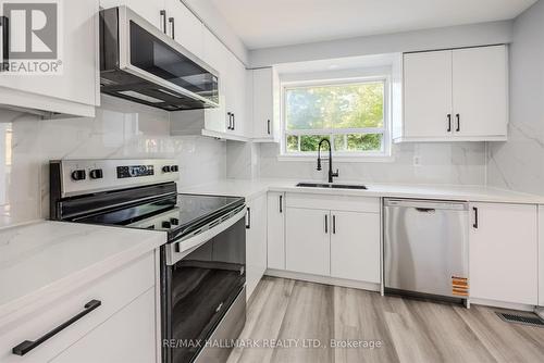 2126 Pashak Court, Mississauga, ON - Indoor Photo Showing Kitchen With Double Sink
