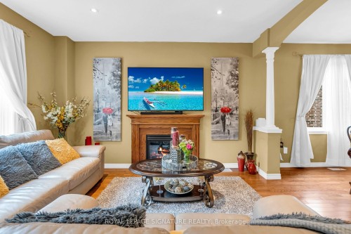 26 Frasson Drive, Guelph, ON - Indoor Photo Showing Living Room With Fireplace