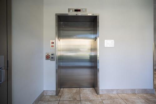 Ascenseur - 602-480 Boul. Galland, Dorval, QC - Indoor Photo Showing Other Room