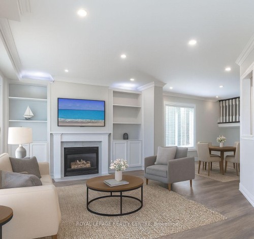 62-455 Apache Court, Mississauga, ON - Indoor Photo Showing Living Room With Fireplace