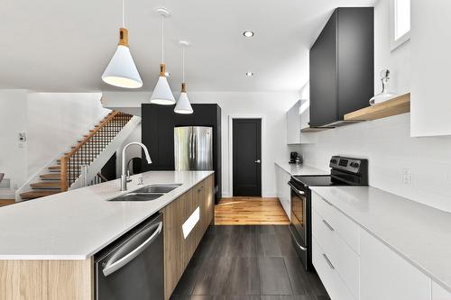Kitchen - 16940 Rue Du Zircon, Mirabel, QC - Indoor Photo Showing Kitchen With Double Sink With Upgraded Kitchen