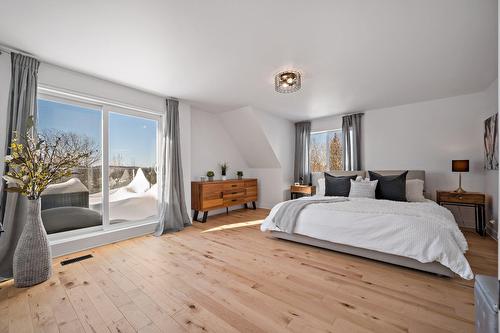 Chambre à coucher principale - 22 Rue Des Ardoises, Sainte-Agathe-Des-Monts, QC - Indoor Photo Showing Bedroom