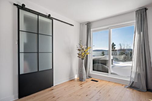 Chambre à coucher principale - 22 Rue Des Ardoises, Sainte-Agathe-Des-Monts, QC - Indoor Photo Showing Other Room