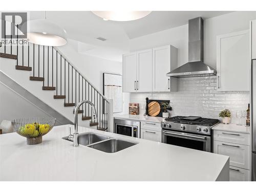 Kitchen - Photo of a similar home in the community. - 1979 Country Club Drive Unit# 6, Kelowna, BC - Indoor Photo Showing Kitchen With Double Sink With Upgraded Kitchen