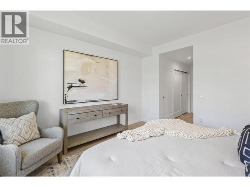 Photo of a similar home in the community. - 1979 Country Club Drive Unit# 6, Kelowna, BC - Indoor Photo Showing Bedroom