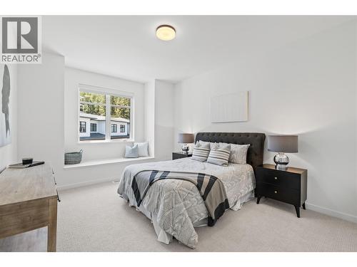 Third bedroom -Photo of a similar home in the community. - 1979 Country Club Drive Unit# 6, Kelowna, BC - Indoor Photo Showing Bedroom